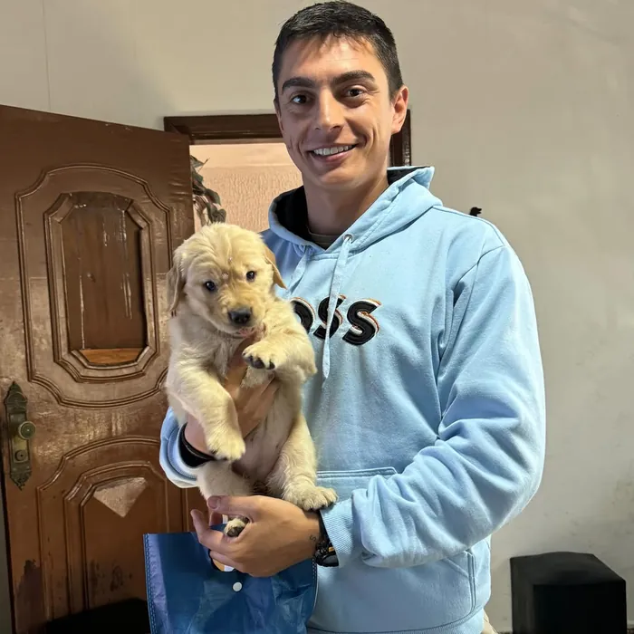 Família cliente do Canil Golden Prime: Gustavo e o Bento